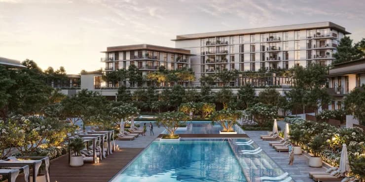 Resort-style pool courtyard at sunset at Rashid Yachts & Marina