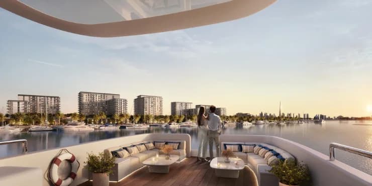 View from a superyacht deck over the marina toward the Dubai skyline